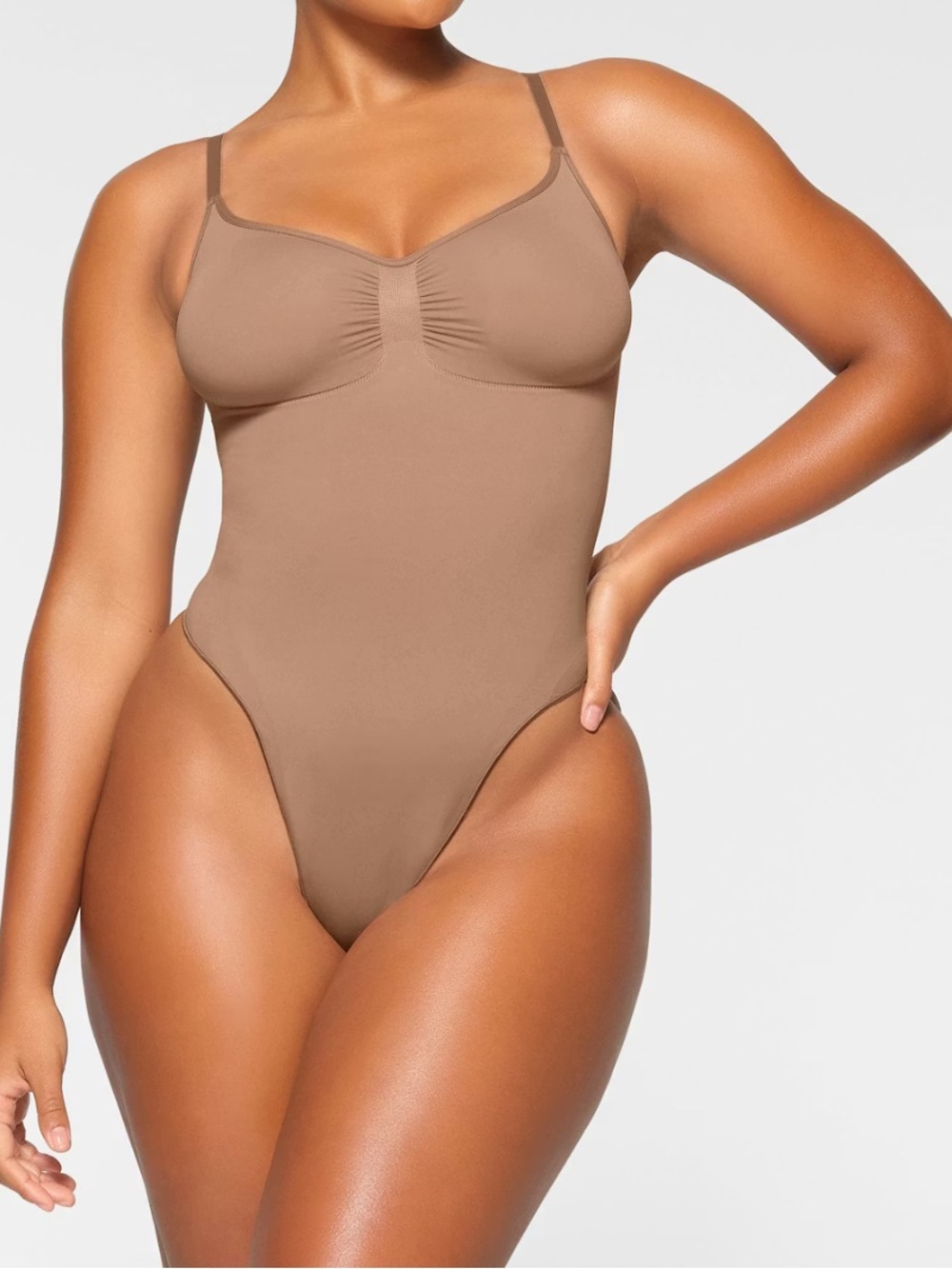 SKIMS Sienna Seamless Shaping Thong Bodysuit - Sienna Brown